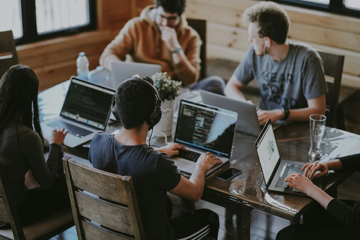 A team connecting ideas around a shared table